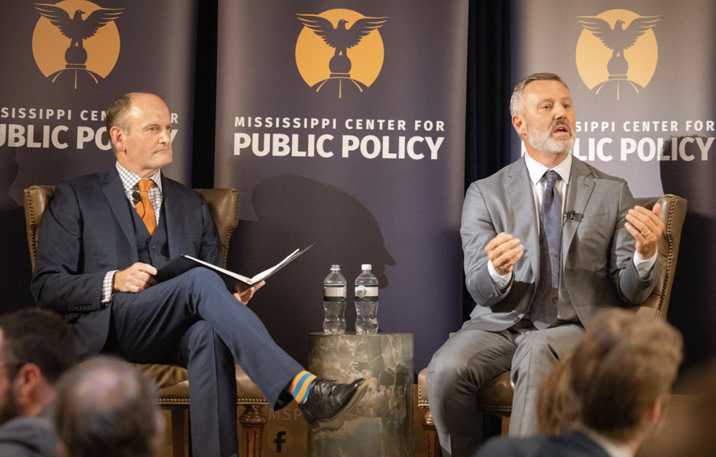 On stage at an MCPP Speaker Series event